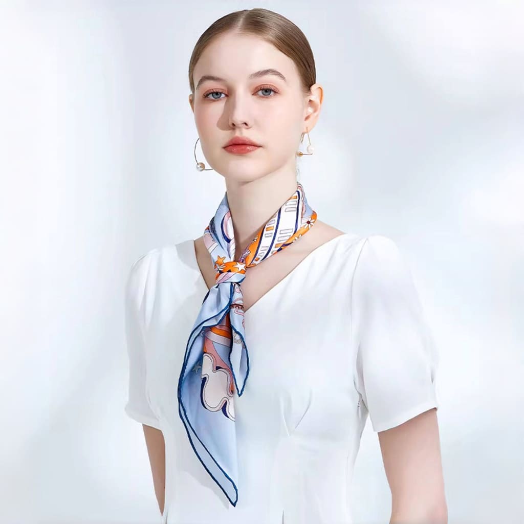 Woman wearing a colorful scarf on a white background